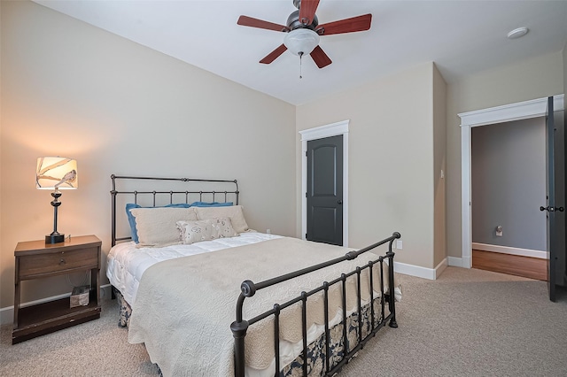 804 Enid St Unit A, Houston, TX 77009 - bedroom with light carpet, baseboards, and ceiling fan