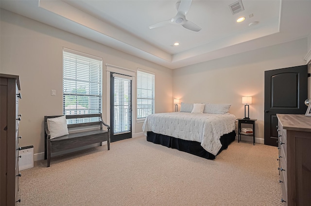 804 Enid St Unit A, Houston, TX 77009 - bedroom featuring light carpet, a raised ceiling, baseboards, recessed lighting, and ceiling fan
