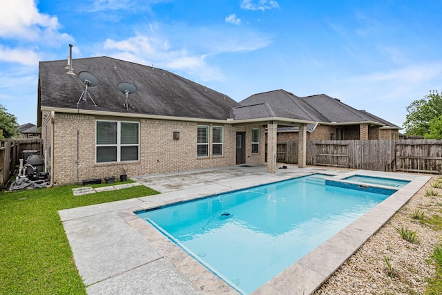21734 Parsley Mist Ln, Richmond, TX 77469 - view of swimming pool with a patio area and a pool with connected hot tub