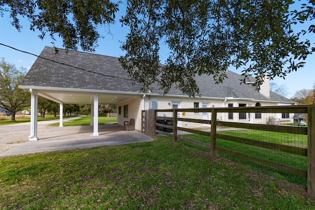 17631 Huffmeister Rd, Cypress, TX 77429 - view of yard with a patio and a carport