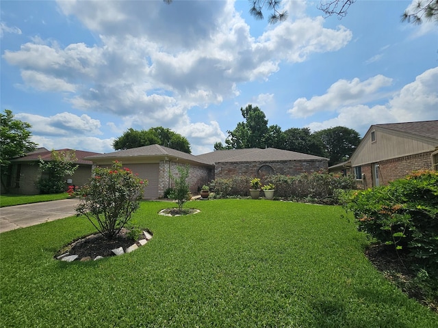 918 Halewood Dr, Houston, TX 77062 - ranch-style home featuring brick siding, concrete driveway, a garage, and a front lawn