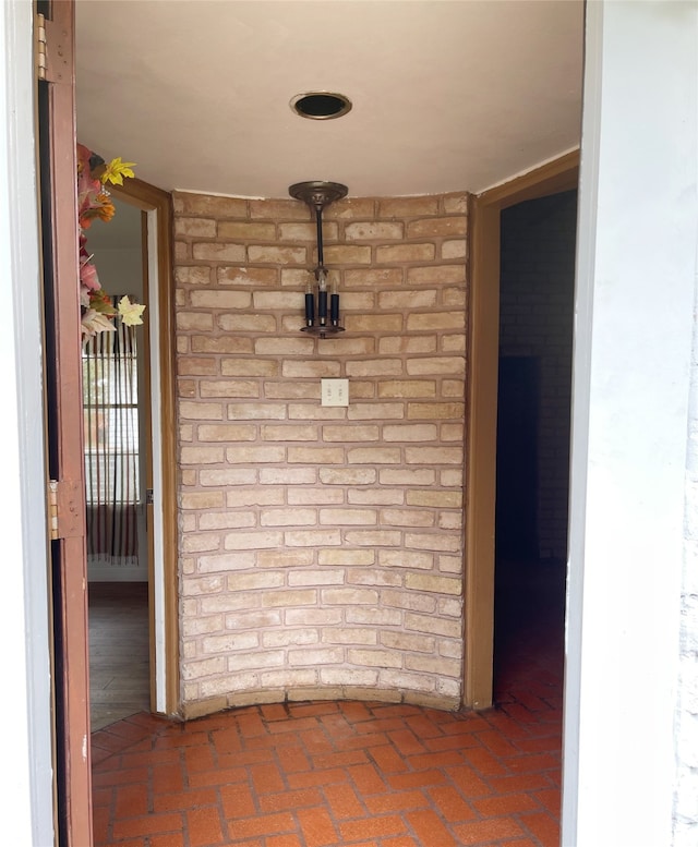 10214 Moorberry Ln, Houston, TX 77043 - empty room with brick floors