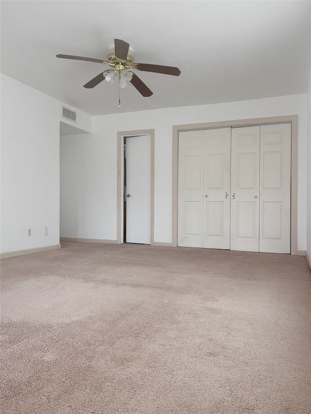 10214 Moorberry Ln, Houston, TX 77043 - unfurnished bedroom with carpet flooring, a ceiling fan, and baseboards