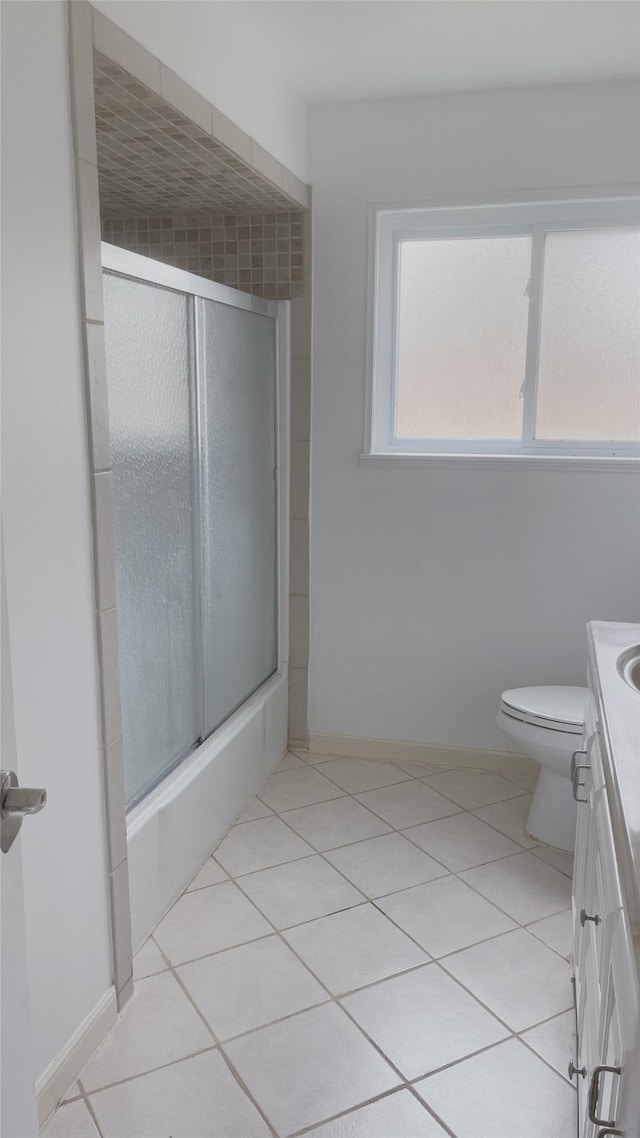10214 Moorberry Ln, Houston, TX 77043 - full bathroom featuring vanity, tile patterned flooring, toilet, and baseboards
