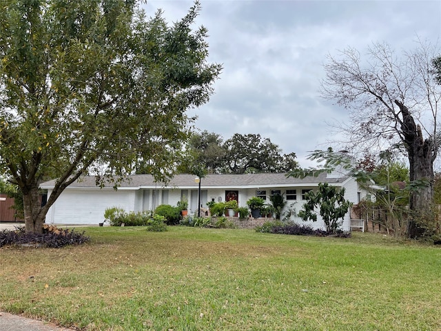 10214 Moorberry Ln, Houston, TX 77043 - single story home with a front yard and an attached garage
