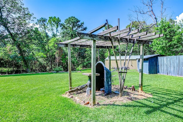 637 County Road 6502 E, Dayton, TX 77535 - view of grassy yard featuring a pergola