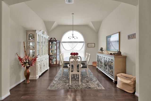3909 Aspen Dr, Montgomery, TX 77356 - dining area featuring a chandelier, dark wood-style floors, lofted ceiling, and baseboards