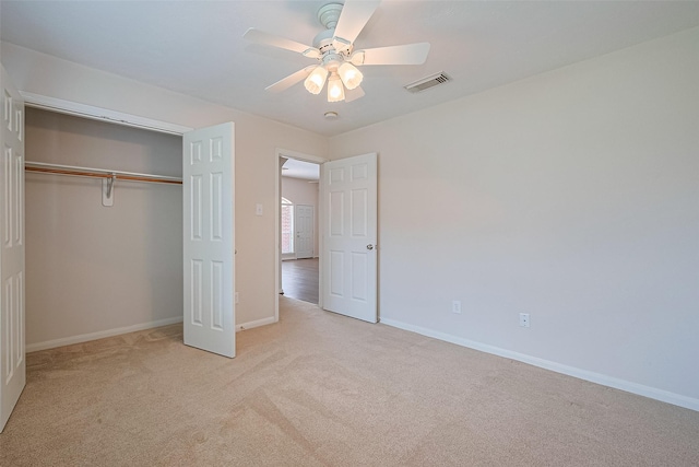 2311 Foster Leaf Ct, Richmond, TX 77406 - unfurnished bedroom featuring carpet flooring, a closet, and a ceiling fan