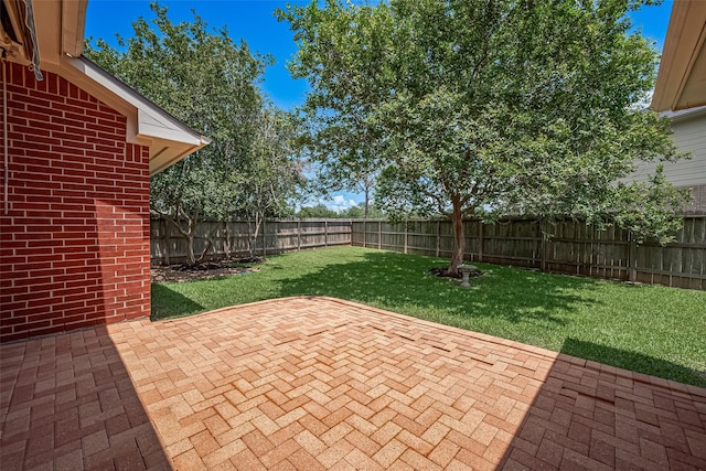 2311 Foster Leaf Ct, Richmond, TX 77406 - fenced backyard with a patio area