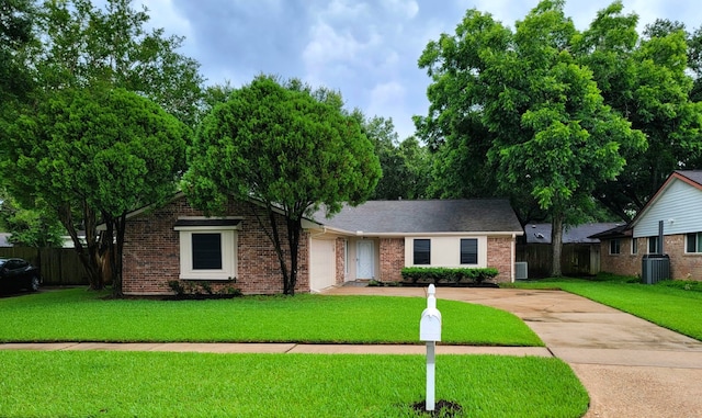 3135 Apple Dr, Missouri City, TX 77459 - single story home with driveway, an attached garage, and brick siding