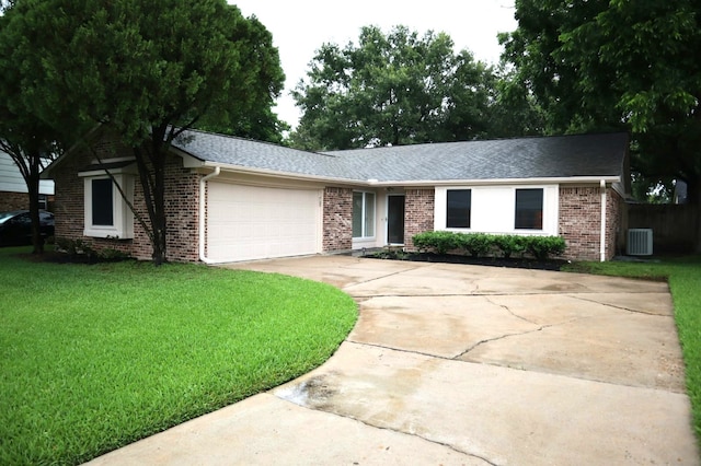 3135 Apple Dr, Missouri City, TX 77459 - ranch-style house featuring brick siding, concrete driveway, a front yard, and a garage