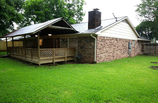3135 Apple Dr, Missouri City, TX 77459 - back of house with brick siding and a chimney