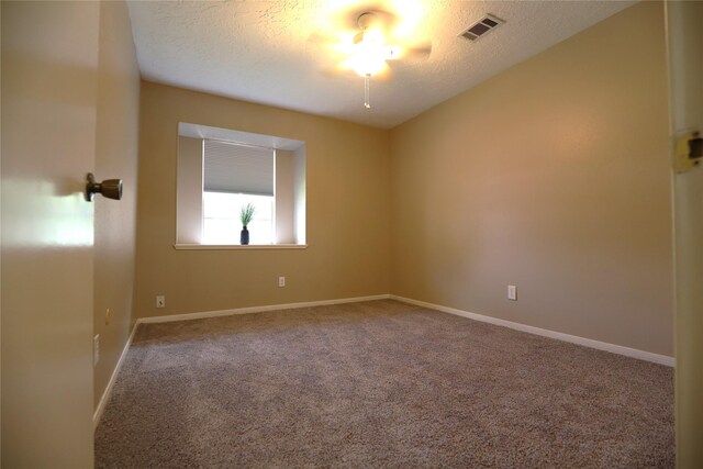 3135 Apple Dr, Missouri City, TX 77459 - spare room with a textured ceiling and carpet floors