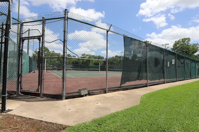 3135 Apple Dr, Missouri City, TX 77459 - view of tennis court with a gate