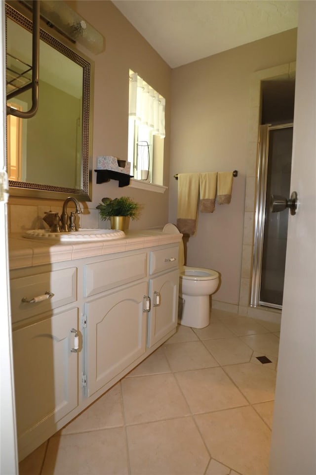 3135 Apple Dr, Missouri City, TX 77459 - bathroom featuring vanity, a shower stall, and tile patterned floors