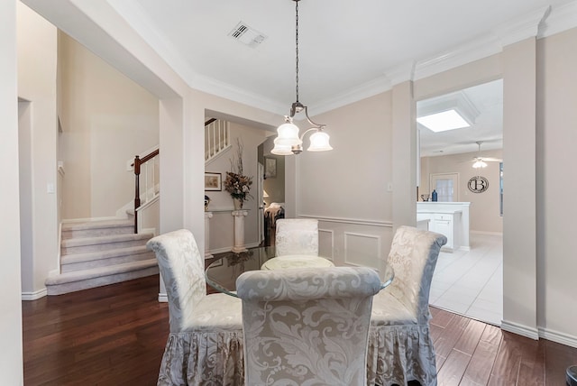 17131 Valley Palms Dr, Spring, TX 77379 - dining room with stairway, crown molding, a ceiling fan, and wood finished floors