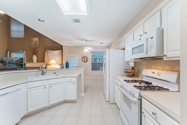 17131 Valley Palms Dr, Spring, TX 77379 - kitchen featuring white appliances, light countertops, and white cabinets