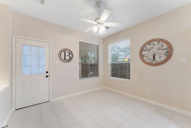 17131 Valley Palms Dr, Spring, TX 77379 - entryway with a ceiling fan and baseboards