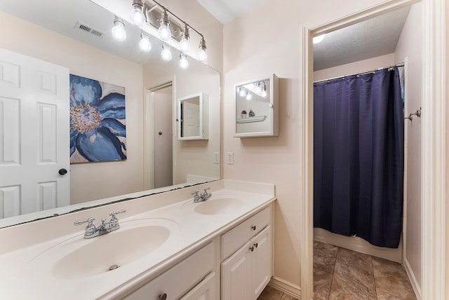 17131 Valley Palms Dr, Spring, TX 77379 - full bath with double vanity and a shower with curtain