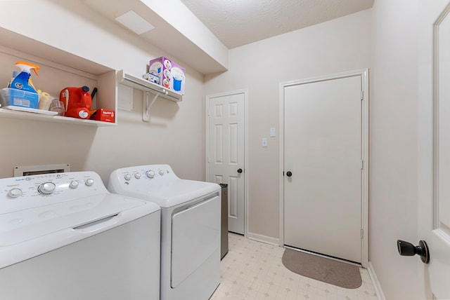 17131 Valley Palms Dr, Spring, TX 77379 - laundry room featuring washer and clothes dryer and light floors