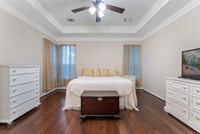 17131 Valley Palms Dr, Spring, TX 77379 - bedroom with a raised ceiling, dark wood-style flooring, and a ceiling fan