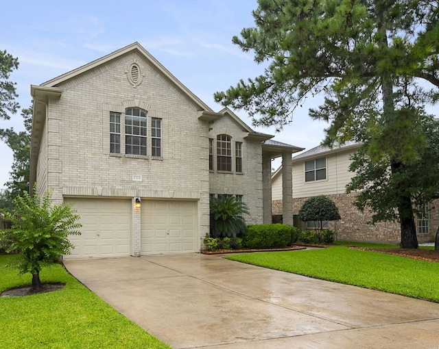 17131 Valley Palms Dr, Spring, TX 77379 - view of front of house featuring brick siding, driveway, a garage, and a front lawn