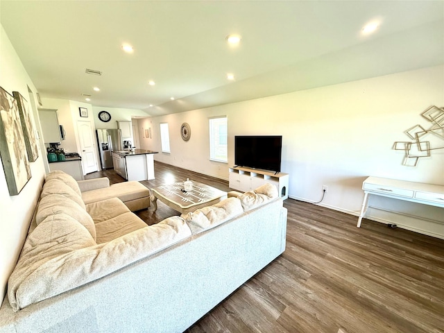24446 Elmwood Falls Dr, Spring, TX 77373 - living room featuring dark wood-style floors, recessed lighting, and baseboards