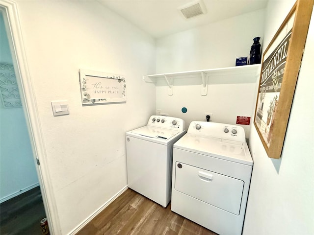 24446 Elmwood Falls Dr, Spring, TX 77373 - laundry area featuring washer and dryer, dark wood-style flooring, and baseboards