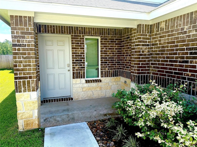24446 Elmwood Falls Dr, Spring, TX 77373 - entrance to property featuring brick siding and roof with shingles