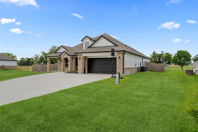 1420 Palomino Trl, Angleton, TX 77515 - view of front of home featuring brick siding, central AC unit, concrete driveway, a garage, and roof with shingles