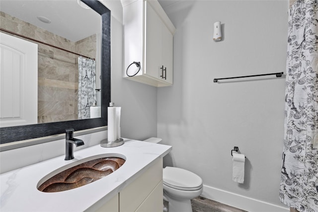 1420 Palomino Trl, Angleton, TX 77515 - bathroom with vanity, toilet, a shower with shower curtain, and wood finished floors
