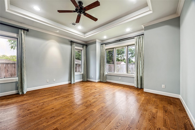 5311 Indigo St, Houston, TX 77096 - spare room featuring a raised ceiling, crown molding, ceiling fan, wood finished floors, and recessed lighting