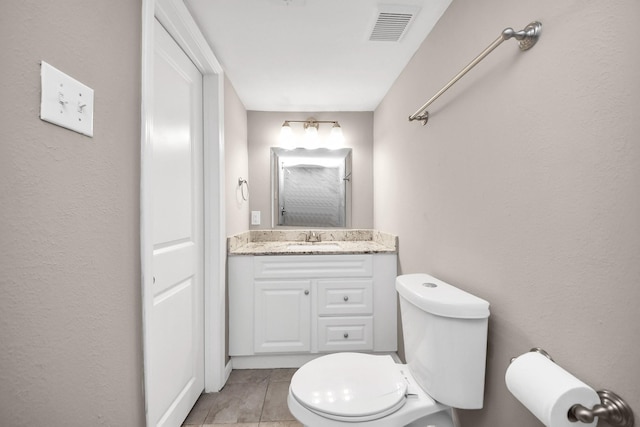 5130 Enyart St, Houston, TX 77021 - bathroom featuring toilet, vanity, and tile patterned floors
