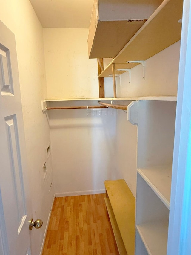 11442 Galbreath Dr, Houston, TX 77066 - walk in closet with light wood-type flooring