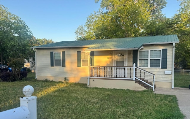 1412 Park Ln, Kilgore, TX 75662 - view of front of property with metal roof and covered porch