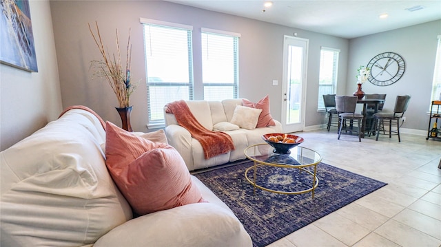 6005 Diamond Sky Ln, Houston, TX 77048 - tiled living area with baseboards and recessed lighting