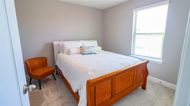 6005 Diamond Sky Ln, Houston, TX 77048 - bedroom featuring light colored carpet and baseboards