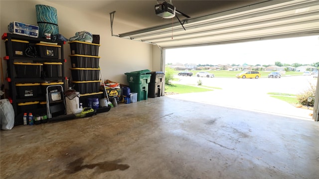 6005 Diamond Sky Ln, Houston, TX 77048 - garage featuring a garage door opener