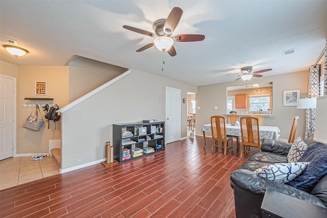 6623 Haven Forest Ln, Richmond, TX 77469 - living area with a ceiling fan, baseboards, and wood finished floors