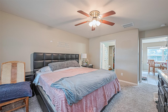 6623 Haven Forest Ln, Richmond, TX 77469 - bedroom with light carpet, baseboards, and ceiling fan