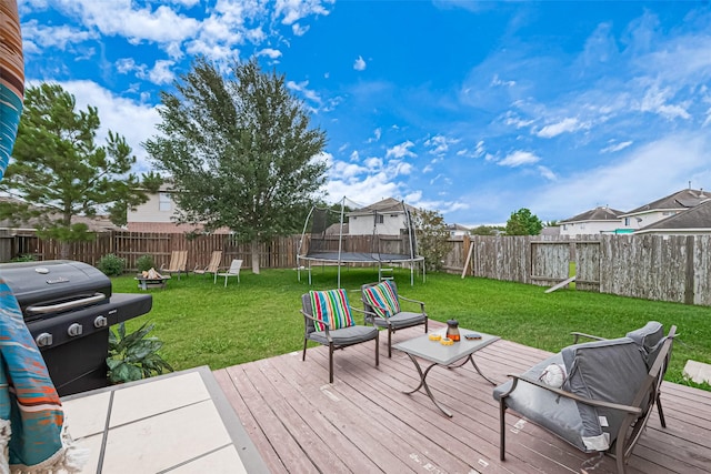 6623 Haven Forest Ln, Richmond, TX 77469 - wooden terrace with a trampoline