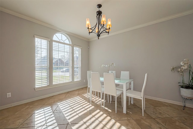 2213 Jernigan Frd, Dickinson, TX 77539 - tiled dining space with a chandelier, crown molding, and baseboards