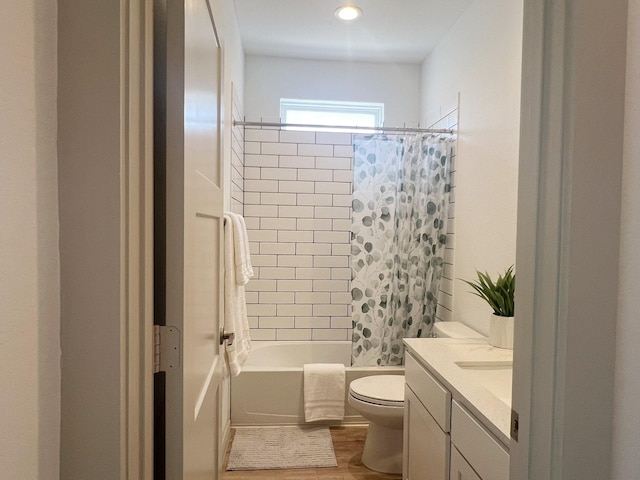 10023 Angelina Woods Ln, Conroe, TX 77384 - full bath with toilet, vanity, shower / bath combo, and wood finished floors