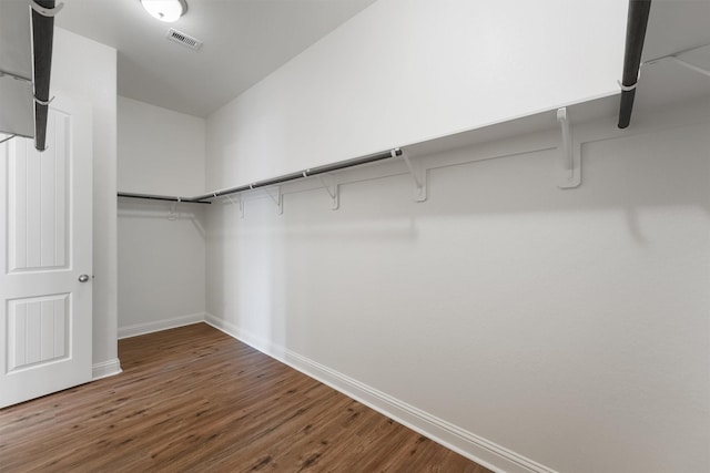 10091 Black Maple Dr, Conroe, TX 77385 - spacious closet featuring wood finished floors
