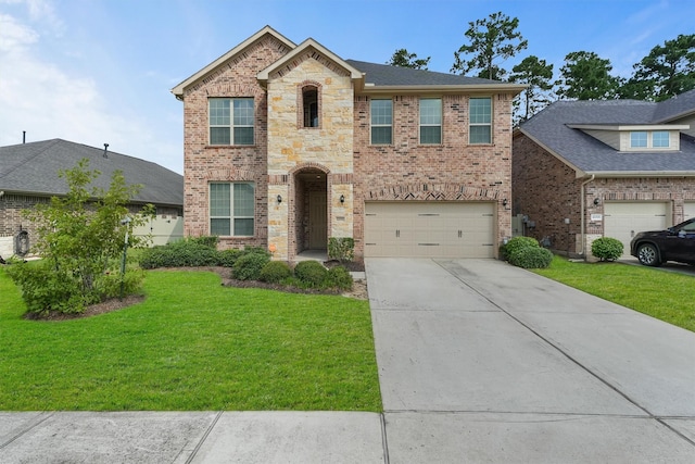 10091 Black Maple Dr, Conroe, TX 77385 - view of front of home with brick siding, concrete driveway, a front yard, and an attached garage