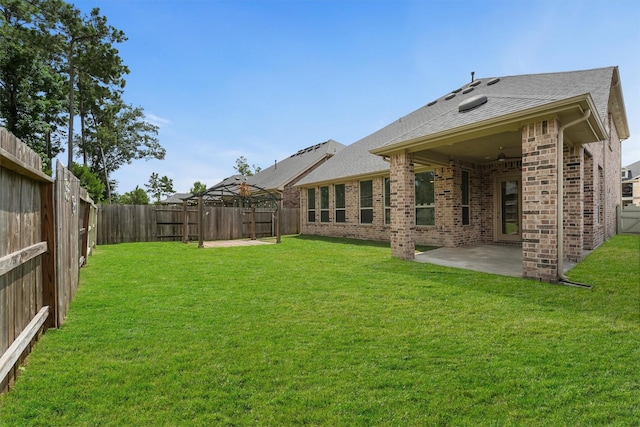 10091 Black Maple Dr, Conroe, TX 77385 - view of yard with a patio area and a ceiling fan