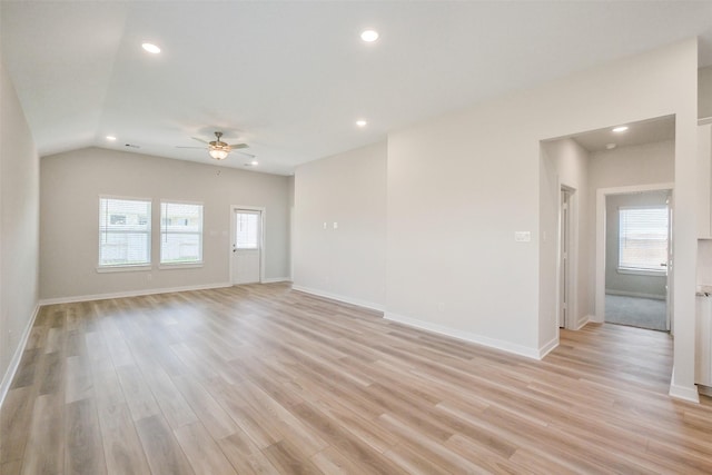 1203 Wildflower Way Dr, Beasley, TX 77417 - empty room featuring a ceiling fan, plenty of natural light, recessed lighting, light wood-type flooring, and lofted ceiling