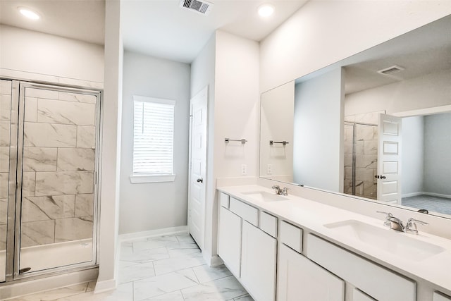 1203 Wildflower Way Dr, Beasley, TX 77417 - bathroom featuring marble look tile flooring, a stall shower, double vanity, and recessed lighting