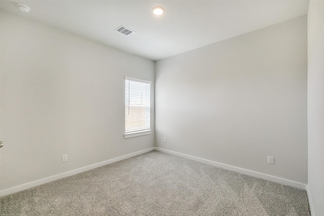 1203 Wildflower Way Dr, Beasley, TX 77417 - empty room featuring light carpet and baseboards