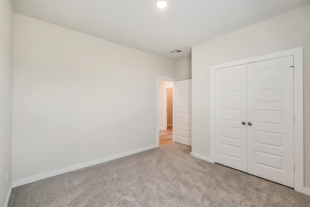 1203 Wildflower Way Dr, Beasley, TX 77417 - unfurnished bedroom featuring carpet floors and a closet